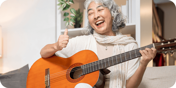 A lady smiling after being fitted with a dental crown.